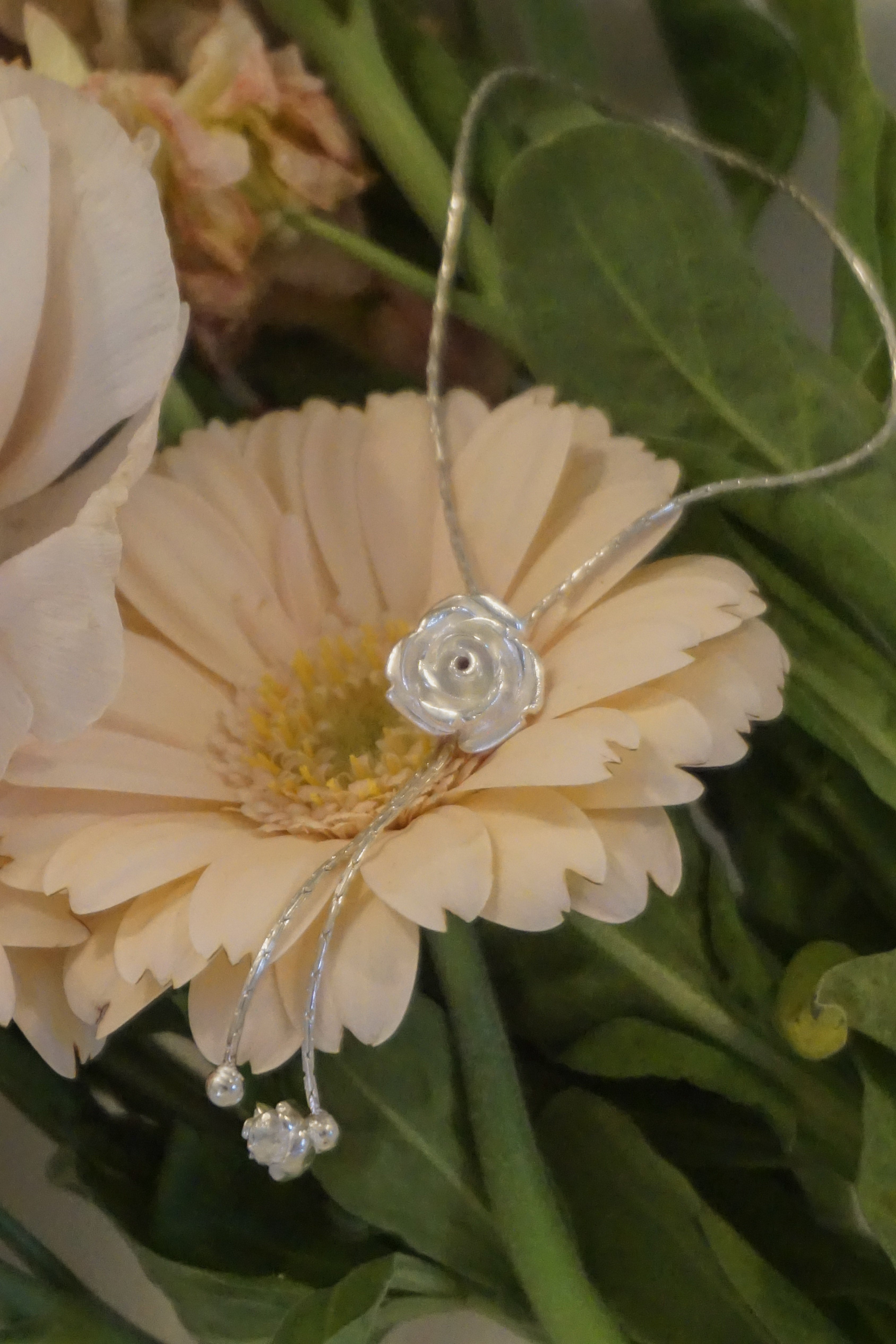 DOUBLE FLOWER DROP BRACELET