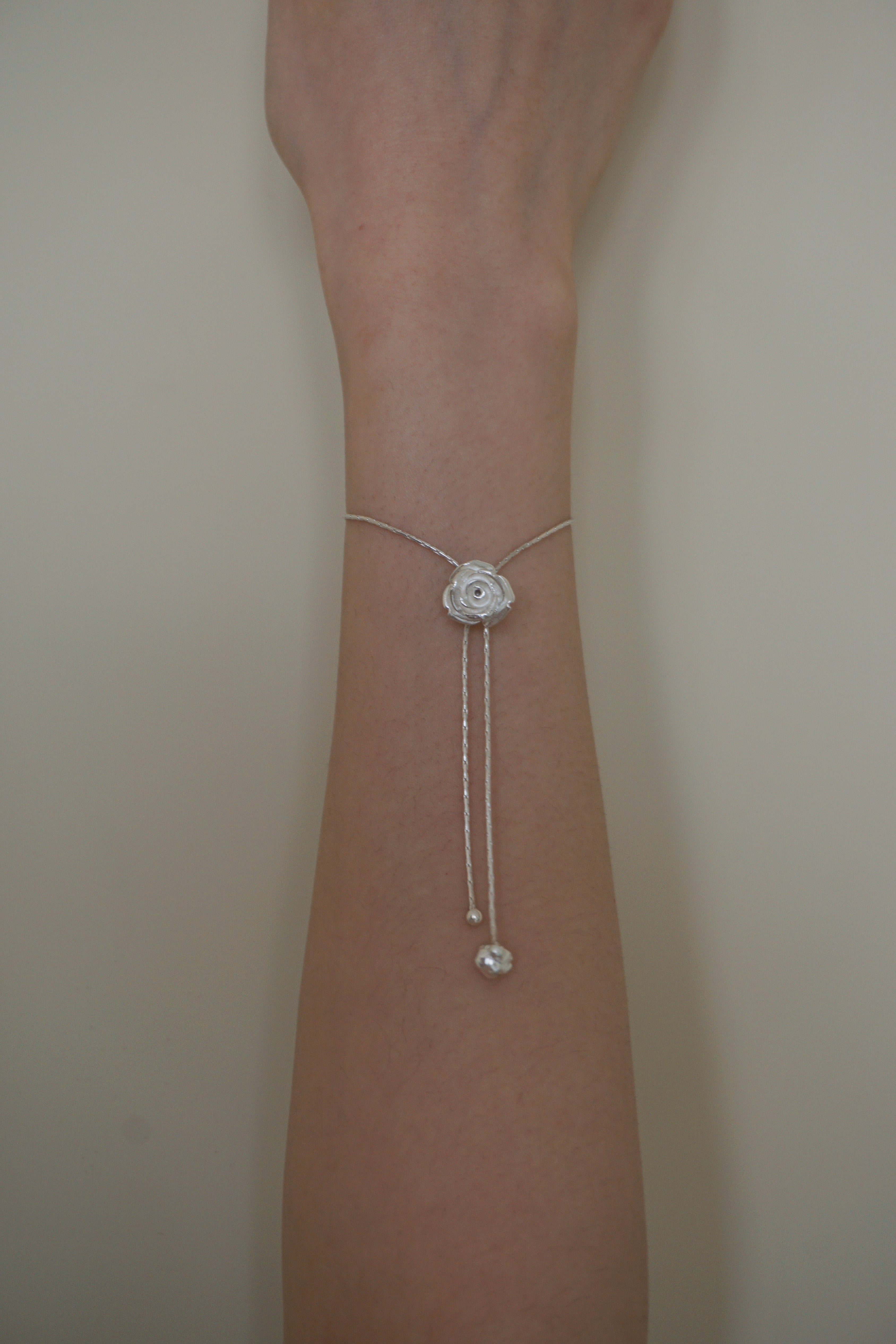 DOUBLE FLOWER DROP BRACELET