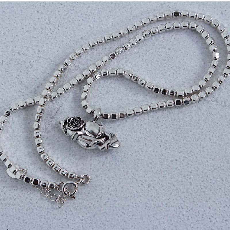 saturn cube chain necklace