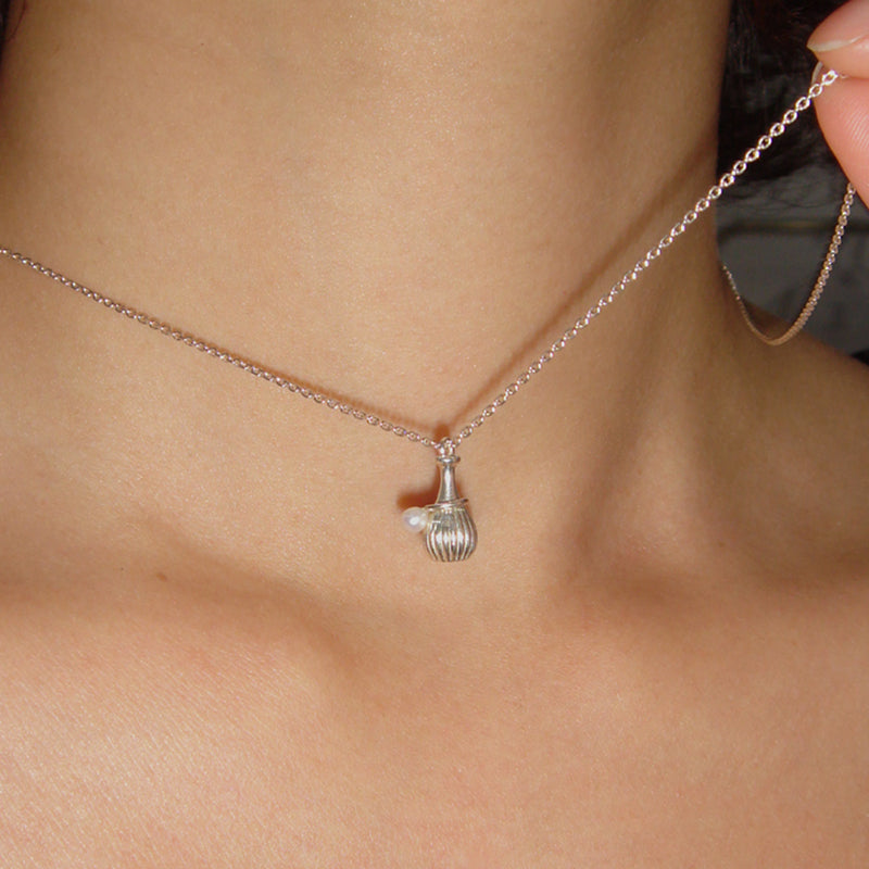 oriental melon bottle pendant