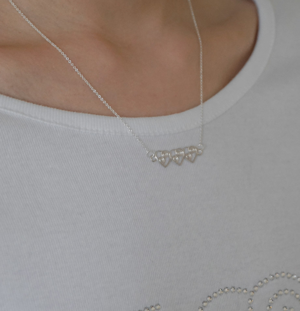 RHYTHM TRIPLE HEART NECKLACE