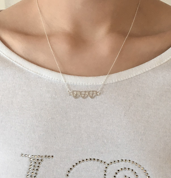 RHYTHM TRIPLE HEART NECKLACE