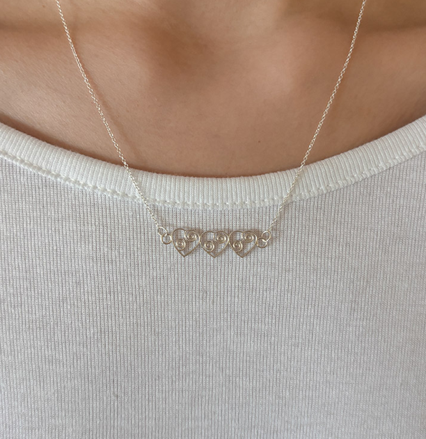 RHYTHM TRIPLE HEART NECKLACE